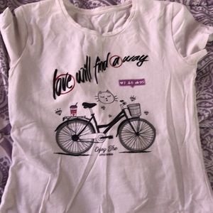 A white shirt with “love will find a way” message